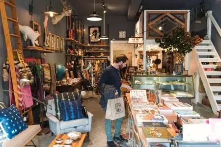 A man shops for items inside A boutique in San Francisco's NoPa neighborhood.